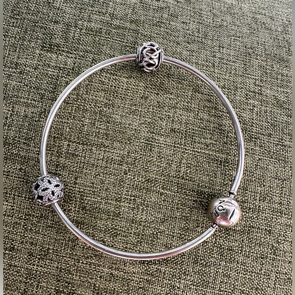 Pandora Essence bangle bracelet with 2 charms